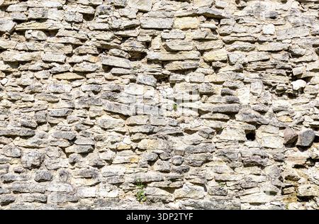 Rough gray stone wall as creative background. Grunge brick wall texture background Stock Photo