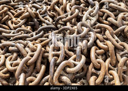 Background from huge old rusty anchor chains Stock Photo