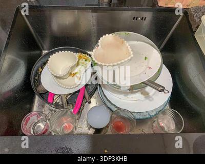 Dirty Dish Mountain In Sink. Stock Photo
