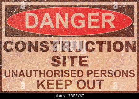 Rusty old danger construction site unauthorised persons keep out sign background backdrop. Construction site warning sign concept. Stock Photo