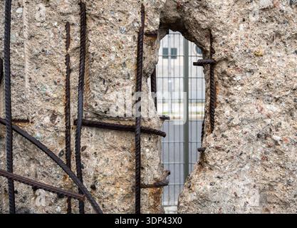 Berlin, germany, august 13, 2023. Berlin wall memorial featuring a concrete slab with exposed rebar, symbolizing division, freedom, and cold war histo Stock Photo