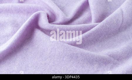 Pure natural cashmere texture in fashionable lilac violet color. Abstract background with copy space. Stock Photo