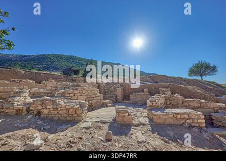 Ruins of the Terrace Houses and small retail shops on the main pedestrian street of Curetes Street in the ruined city of Ephesus, Turkey, West Asia Stock Photo