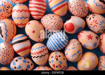 Bright Patterned Easter Eggs on Blue Background Stock Photo