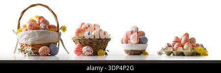 Set of colorful Easter Eggs in Rustic Baskets Stock Photo