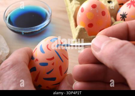 Person Painting Colorful Easter Egg Close Up Stock Photo