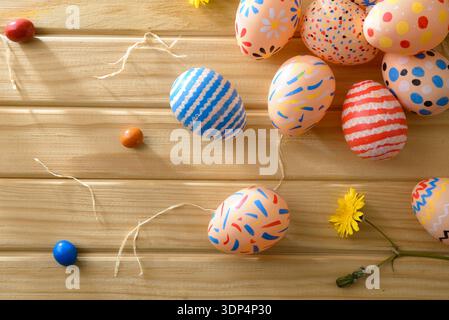 Close Up of Colorful Easter Eggs on Wood Stock Photo