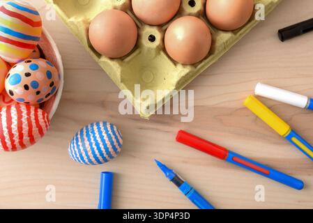 Top View Easter Eggs and Painting Supplies Stock Photo