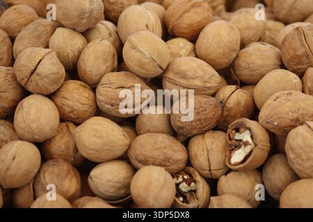 close up of whole walnuts in the market Stock Photo
