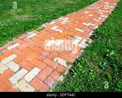 Garden path made of ordinary brick Stock Photo