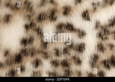 Leopard pattern synthetic fur texture background Stock Photo