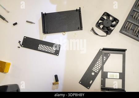 Disassembled computer parts on a white background. Close-up. Stock Photo