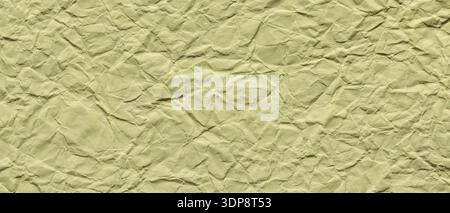 Yellow Crumpled Paper Texture Background with Wrinkled Surface Pattern Stock Photo