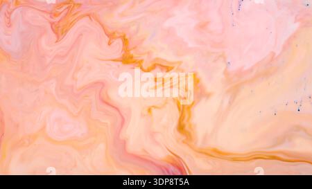 Soft Pink Orange Marble Abstract Background with Swirling Liquid Paint Texture Pattern Stock Photo