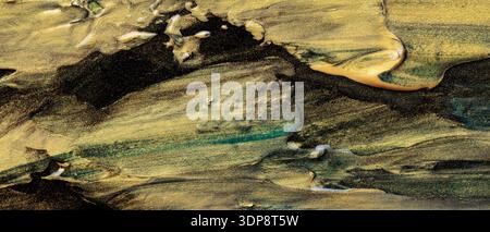 Abstract Gold Black Oil Paint Texture with Glitter Particles and Flowing Marble Pattern Stock Photo