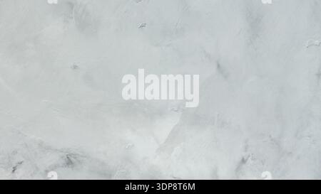 Light Gray White Concrete Wall Texture with Subtle Stains Soft Background Stock Photo