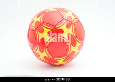 Orange soccer ball on isolated white background Stock Photo