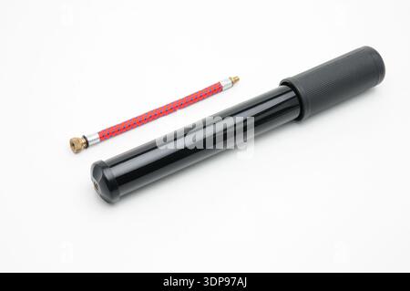 Bicycle pump with hose on isolated white background Stock Photo