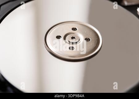 Computer hard drive dissasembled closeup Stock Photo