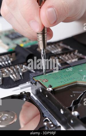 Hard disc drive disassembling close up Stock Photo