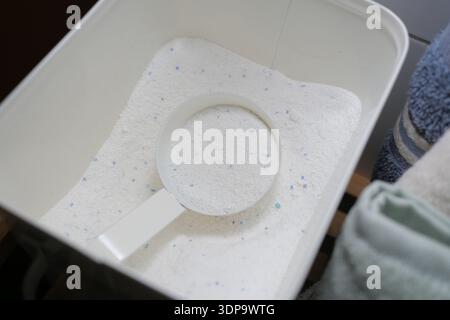 White powder in container with scoop on top Stock Photo