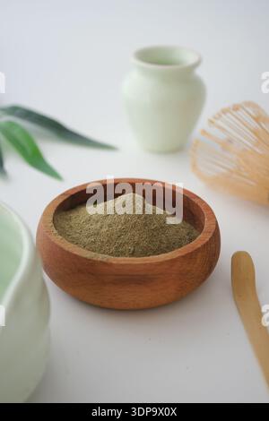 matcha powder in a bowl on a white background  Stock Photo