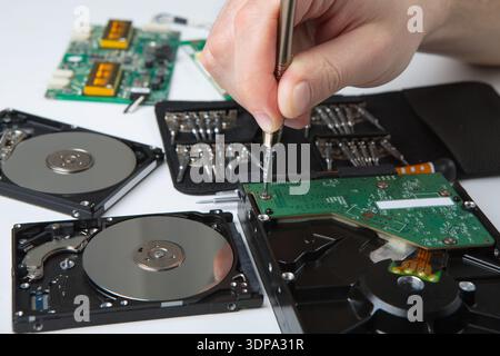 Hard disc drive disassembling close up Stock Photo