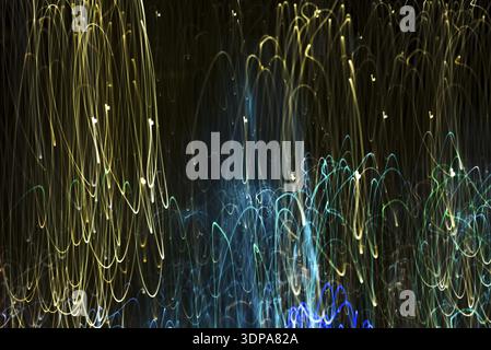 Bright abstract strip patterns from light strips on a black background Stock Photo