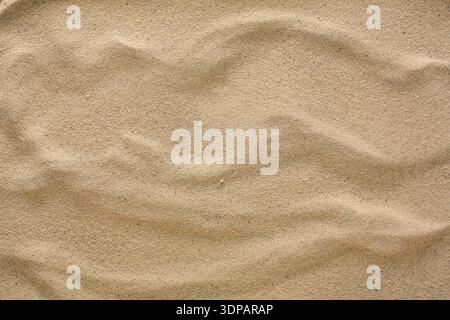 Beach sand background. Natural seashore texture surface Stock Photo
