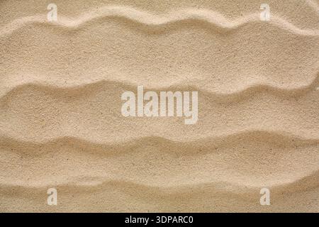 Beach sand background. Natural seashore texture surface Stock Photo
