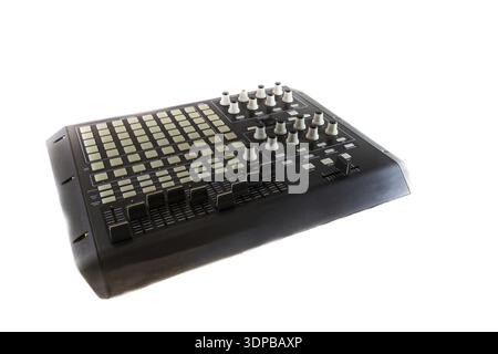 Studio Controller Desk for Electronic Music Production and Music Track Mixing. Shot on white background Stock Photo