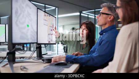 Senior Developer And Planner Use Computer To Measure Land Plot Stock Photo