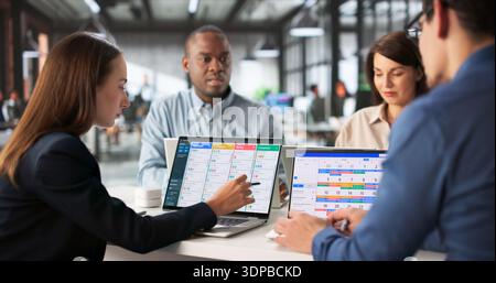 Virtual Multiracial Team Meeting To Plan Schedule Using Kanban And Gantt. Stock Photo