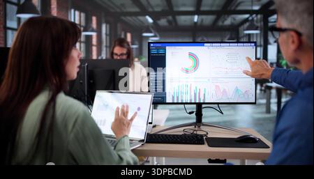 Business Team Analyzing Data To Boost Key Performance Indicators (KPIs) Stock Photo