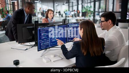 Agile Developing Team Codes New Software On Office Computer Screen Stock Photo