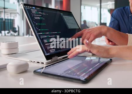 Collaborative Software Development In Modern Office Environment With Diverse Team. Stock Photo