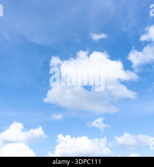 Low angle view and full frame of beautiful blue sky with strange shape of fluffy white clouds in the afternoon on sunny day Stock Photo