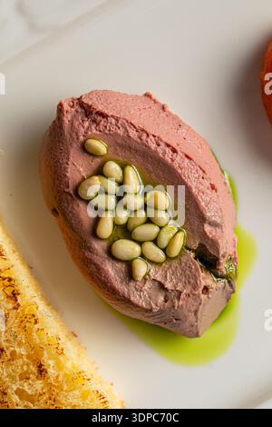 Chicken liver pate with pine nuts Stock Photo