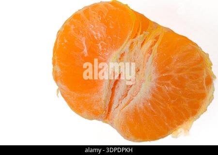 Peeled mandarin fruit showing juicy segments close up Stock Photo