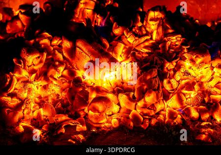 Red hot burning coals as a creative background Stock Photo