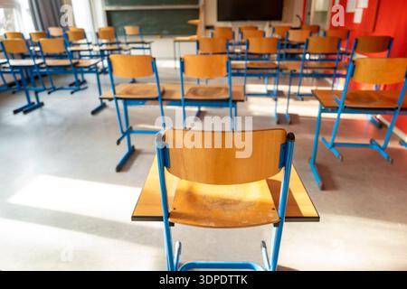 A view of an empty classroom and chairs in Bavaria with students off school. Stock Photo