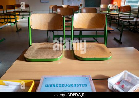 A view of an empty classroom and chairs in Bavaria with students off school. Stock Photo