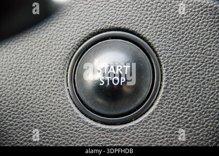 The Start-Stop Engine button has become a standard element in the interior design of modern cars Stock Photo