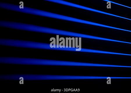 Blue light stripes with deep perspective. Neon stripes. Stock Photo