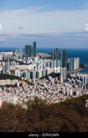 Busan city panorama beautiful skyline view from Hwangnyeongsan mountain observatory, Busan port, Gwangan bridge and harbor bay, South Korea, Yeongnam Stock Photo