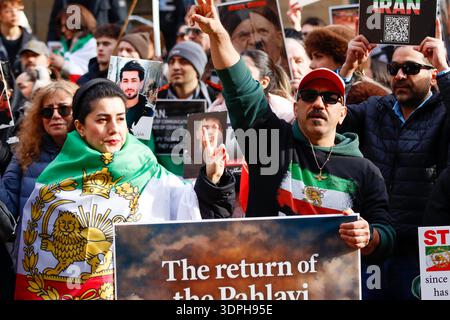 Glasgow, UK. 14th Feb, 2026. Hundreds of protesters gathered on Buchanan Steps in the heart of Glasgow on the 14th of February, 2026, to show support for those killed in recent protests in Iran. Participants called for the removal of Iran's current Supreme Leader, Ayatollah Ali Hosseini Khamenei and for the establishment of a democratic system of government. Protesters carried Iranian flags and banners to raise awareness of the ongoing unrest and human rights concerns in the country. (Photo by Jacob Hughes/Sipa USA) Credit: Sipa USA/Ģ����ý Live News Stock Photo