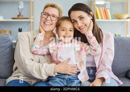 Mother and daughter, granddaughter three generations family portrait together, happy mothers day  Stock Photo