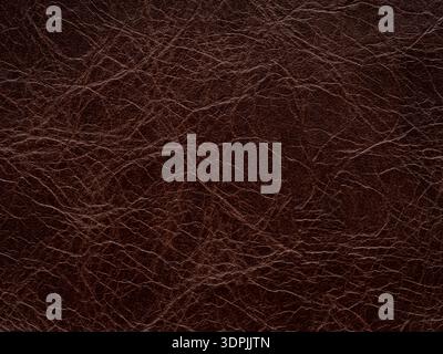 Brown leather natural texture, matte material, abstract background. Genuine quality empty pattern. Stock Photo