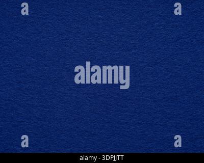 Dark blue matte felt fiber texture. Natural wool for text, lettering, patchwork or 3d art work. Full frame backdrop wallpaper. Matt retro velvet Stock Photo