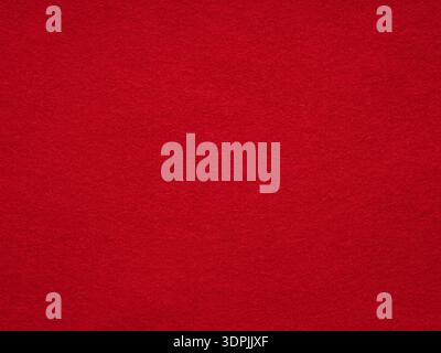 Red felt texture. Saturated background for Christmas desktop, holiday New Year, xmas seasonal decoration, valentin day, text, lettering, patchwork or Stock Photo
